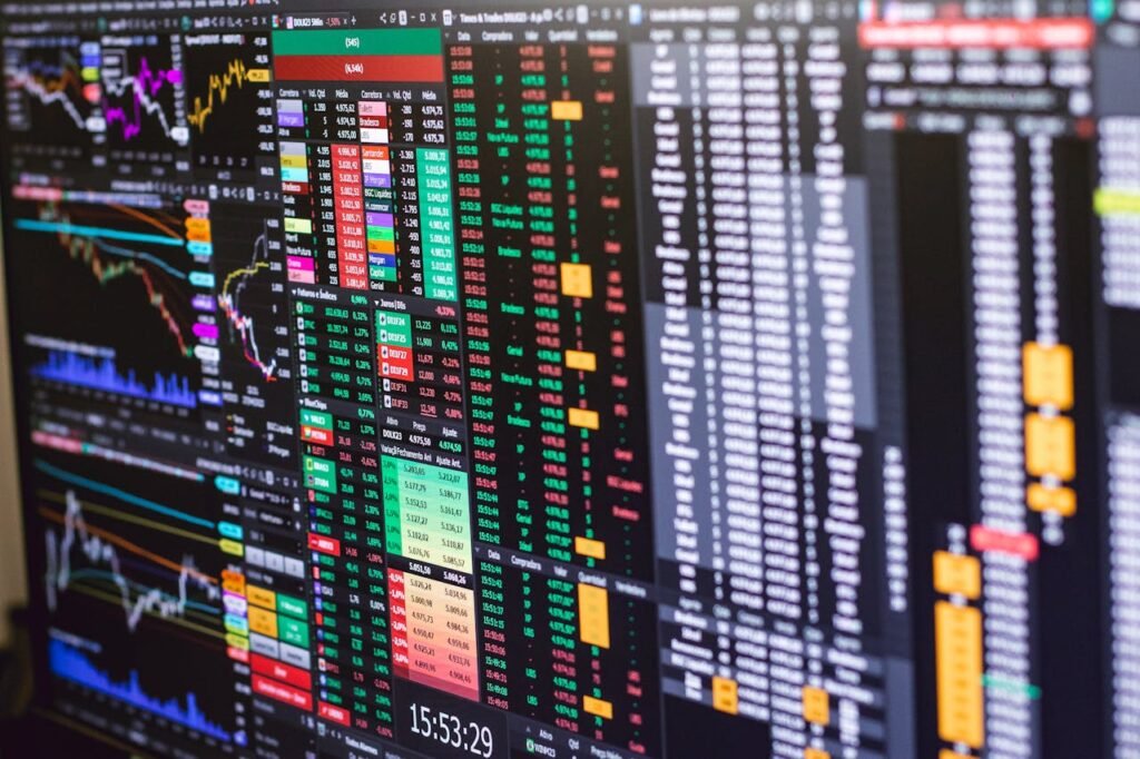 Detailed financial trading screen with colorful charts and data representing market fluctuations.